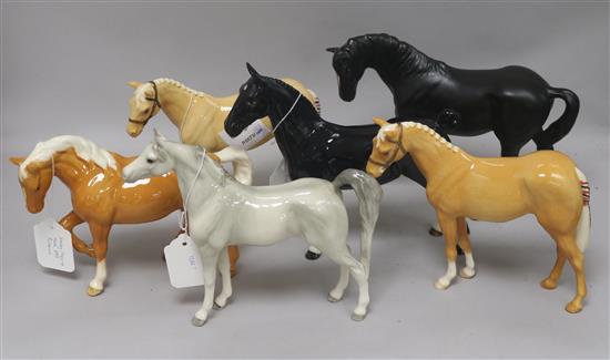 Six Beswick horses: Hackney Black 1361 2 Palomino H259 Stocky Jogging Mare 855 palomino 3rd Black Beauty 2466 and a grey horse